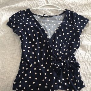 blue and white polka dot wrap shirt